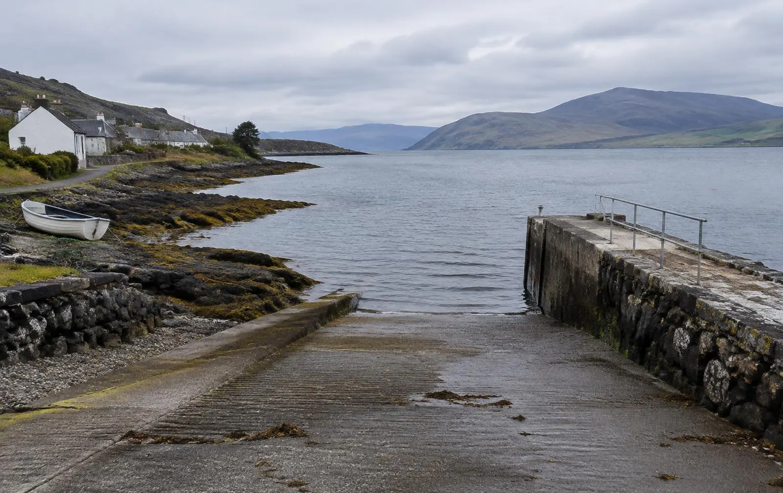 Ferry slipway and whitewashed cottages on the Morvern shore facing the Sound of Mull