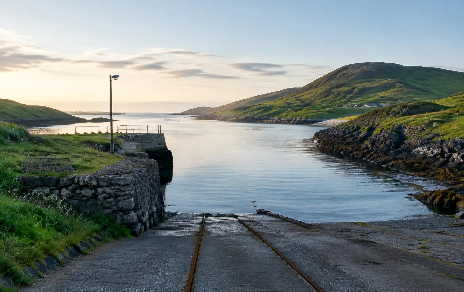 Quiet slipway on an island shore at dawn
